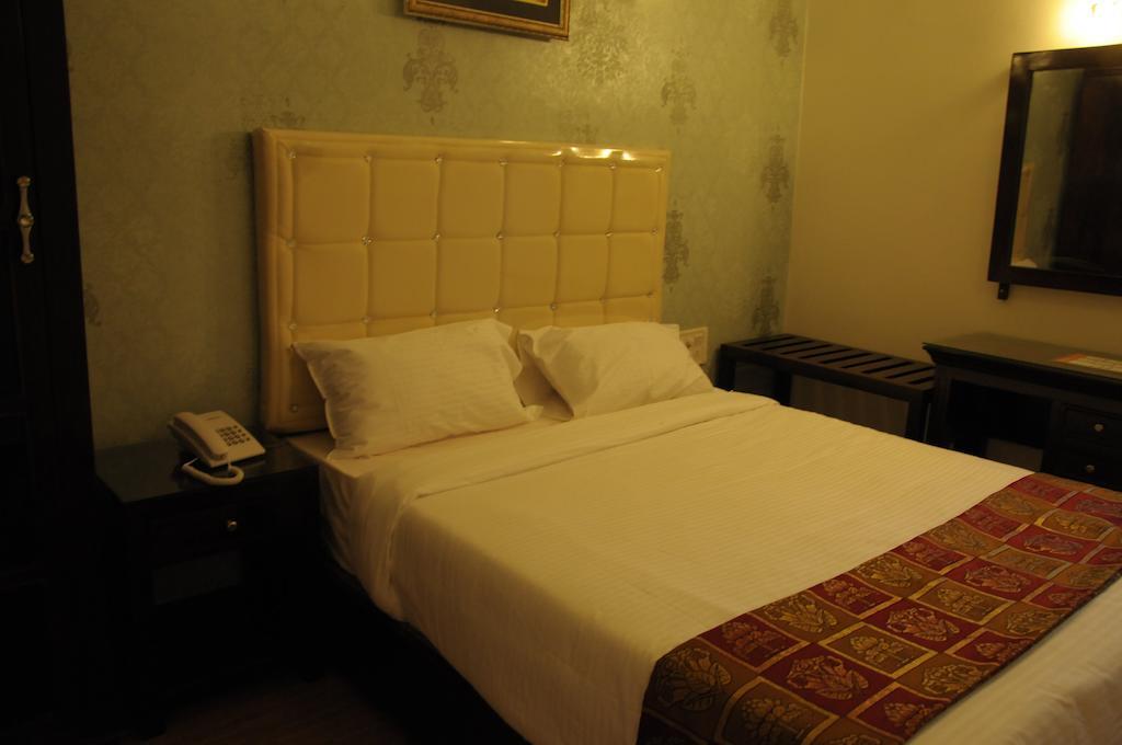 Hotel Executive Inn Vijayawāda Rum bild